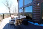Outdoor Seating and Fireplace on Walk-Out Deck 